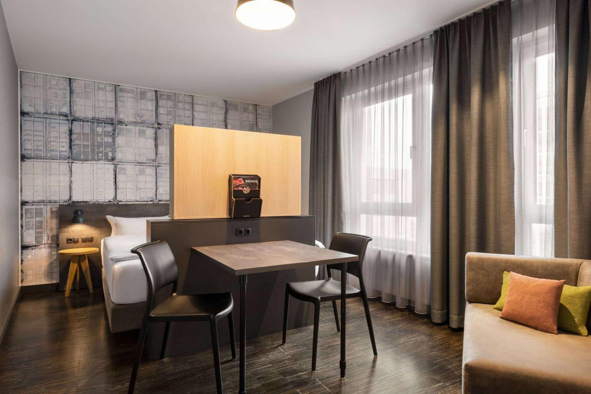 Vienna House Easy By Wyndham Bremen City Apartments Bagian luar foto